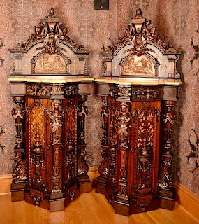 Pair of Renaissance Revival walnut and burl walnut cabinets with pierced carved top over bronze panel over shaped marble top
