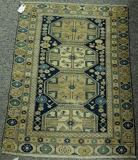 Caucasian Oriental throw rug, early 20th century (some wear). 2'8" x 3'6"