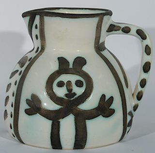 Pablo Picasso (1881-1973) Pitcher Petites Tetes, partially glazed ceramic creamer or pitcher, marked underneath: Edition Pica