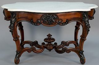 Victorian rosewood marble top center table having turtle shape marble top over carved rosewood base, ht