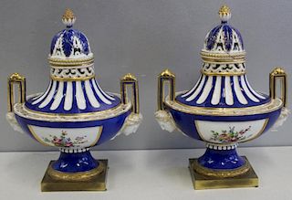 Pair of Sevres Porcelain Lidded Urns
