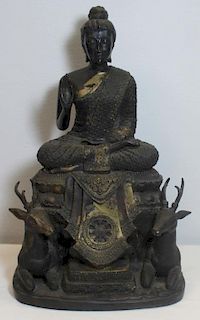Seated Bronze Bodhisattva Flanked by Stags.