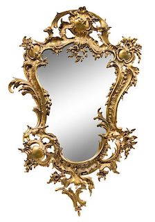 A Louis XV Style Gilt Metal Mirror Height 32 3/4 x width 21 inches.