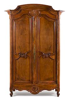 A Louis XV Walnut Armoire Height 106 1/2 x width 58 x depth 25 1/8 inches.