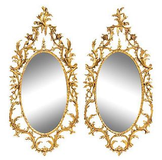 A Pair of Louis XV Giltwood Mirrors Height 54 1/2 x width 26 inches.