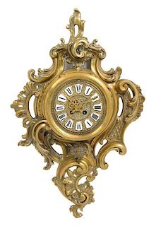 * A Louis XV Style Gilt Bronze Cartel Clock Height 25 1/4 inches.