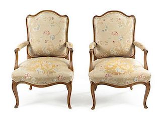 A Pair of Louis XV Style Fauteuils Height 39 1/2 inches.