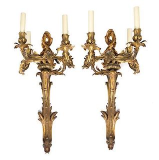 A Pair of Louis XV Style Gilt Metal Four-Light Sconces Height 27 1/2 inches.