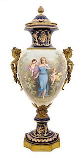 A Sevres Style Gilt Bronze Mounted Porcelain Urn Height 34 inches.
