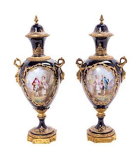 * A Pair of Sevres Style Gilt Metal Mounted Porcelain Vases Height 17 1/2 inches.