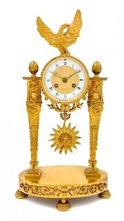 * An Empire Style Gilt Bronze Mantel Clock Height 16 1/4 inches.