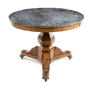 A Louis Philippe Burlwood Center Table Height 28 3/4 x diameter of top 38 1/4 inches.