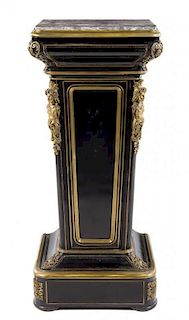 A Napoleon III Gilt Bronze Mounted Ebonized Pedestal Cabinet Height 54 1/8 inches.