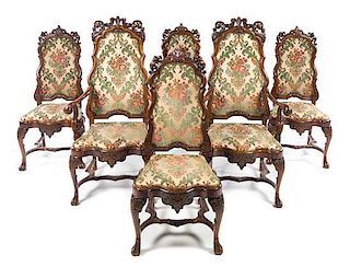 * A Set of Twelve Baroque Style Dining Chairs Height 47 3/4 inches.