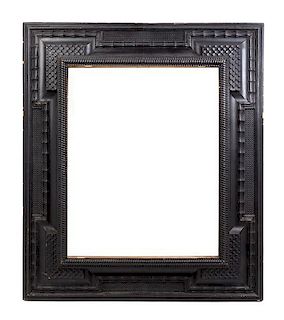A Dutch Baroque Style Frame Height 34 x width 32 inches; aperture 20 9/16 x 19 5/8 inches.