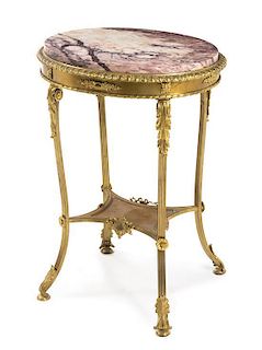 A Neoclassical Giltwood and Brass Occasional Table Height 28 1/2 inches.