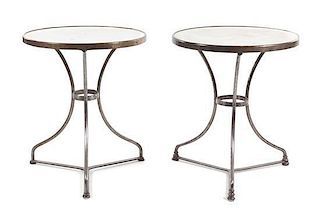 A Pair of Neoclassical Style Steel Gueridons Height 27 x diameter of top 23 1/2 inches.