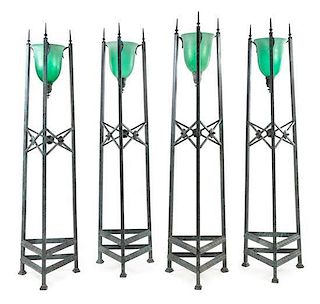 A Set of Four Neoclassical Style Patinated Metal Torcheres Height 78 inches.