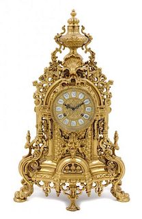 A Neoclassical Style Gilt Brass Mantel Clock Height 23 inches.