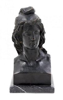 * A Grand Tour Bronze Bust of a Man in a Phrygian Cap Height 10 1/2 inches.