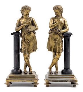 * A Pair of Continental Cast Metal Figures Height 15 inches.