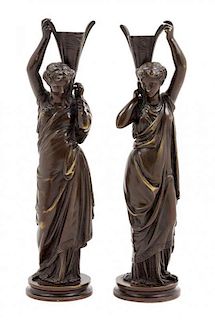 * A Pair of Continental Bronze Figures Height 11 7/8 inches.