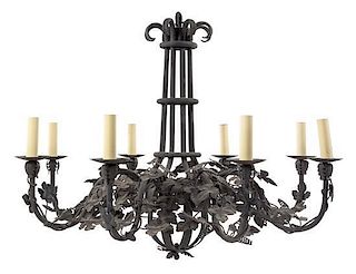A Tole Eight-Light Chandelier Height 31 x diameter 41 1/4 inches.