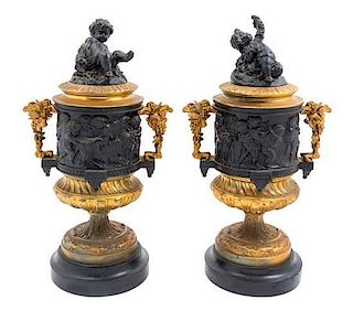 A Pair of Gilt and Patinated Cast Metal Urns Height 5 1/2 inches.