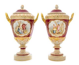 A Pair of Berlin (K.P.M.) Porcelain Urns Height 17 1/2 inches.