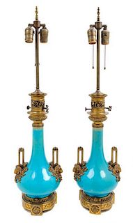 * A Pair of Continental Gilt Bronze Mounted Porcelain Vases Height overall 32 inches.