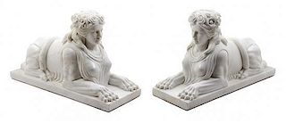 * A Pair of Marble Models of Sphinxes Height 10 x width 5 3/4 x depth 16 1/8 inches.