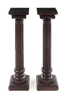 * A Pair of Columnar Pedestals Height 40 inches.