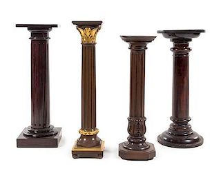 A Group of Four Pedestals Height of tallest 40 1/2 inches.