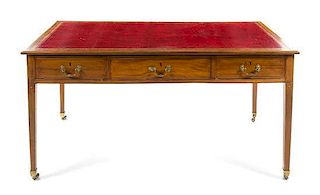 A George III Style Mahogany Library Desk Height 30 3/8 x width 59 1/2 x depth 33 5/8 inches.