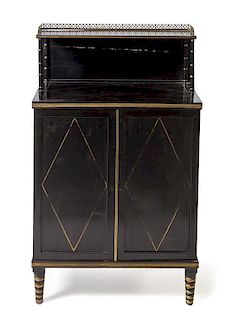A Regency Ebonized Cabinet Height 41 5/8 x width 25 1/2 x depth 14 3/8 inches.