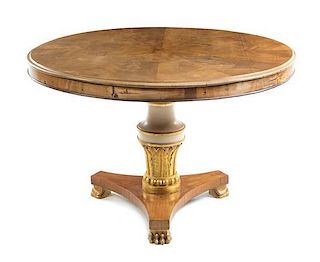 A Regency Style Parcel Gilt Center Table Height 30 x diameter of top 47 inches.