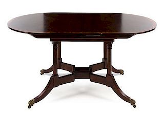 A Regency Style Mahogany Extension Dining Table Height 29 1/2 x width 62 x depth 35 3/4 inches (closed).