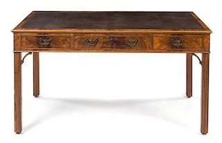 A Chippendale Style Mahogany Desk Height 30 x width 57 1/4 x depth 28 1/2 inches.