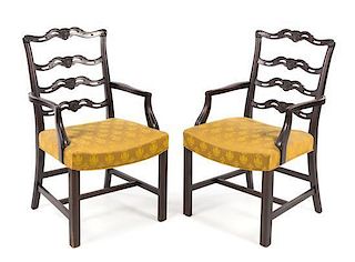 A Pair of Chippendale Style Mahogany Open Armchairs Height 38 1/2 x width 21 1/2 x depth 22 inches.