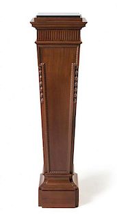 * An Edwardian Mahogany Pedestal Height 50 inches.