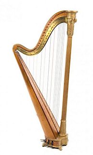 * A Victorian Giltwood and Satinwood Harp Height 65 inches.