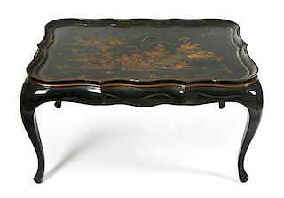 * A Victorian Style Lacquered Tray on Stand Width of tray 31 1/2 inches.