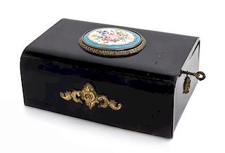 * A Victorian Porcelain Mounted Ebonized Jewelry Box Height 4 x width 10 x depth 6 1/2 inches.