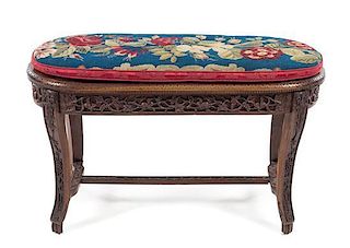 A Victorian Style Walnut Bench Height 24 x width 40 x depth 17 inches.