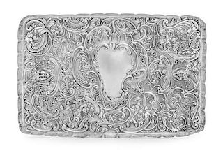 A Victorian Silver Platter, William Comyns, London, 1898, having a scalloped border, worked to show floral sprays, rocaille a