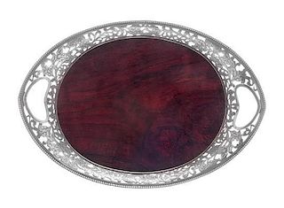 * A Dutch Silver and Mahogany Serving Tray, Assay of Schoonhoven, 1948, of handled oval form, the beaded rim enclosing the op