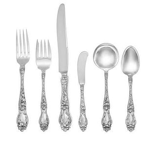 An American Silver Flatware Service, Frank M. Whiting & Co., North Attleboro, MA, Lily pattern, comprising: 12 dinner knives 