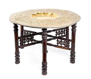 * A Middle Eastern Brass Tray on Stand Height 20 x diameter 30 3/4 inches.