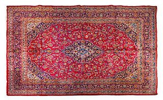 A Kashan Wool Rug 13 feet x 9 feet 6 inches.