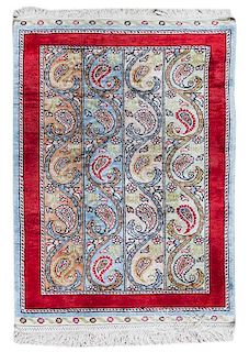 A Persian Silk Prayer Rug 2 feet 3 inches x 1 foot 7 1/4 inches.